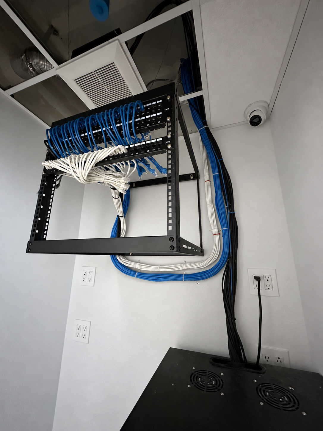 Network rack and installed surveillance camera